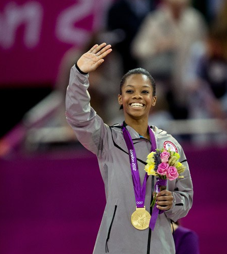 This is Gabby after she won an Olympic gold medal (http://blog.newscom.com/2012/08/the-best-15-pictur (Brian Peterson))